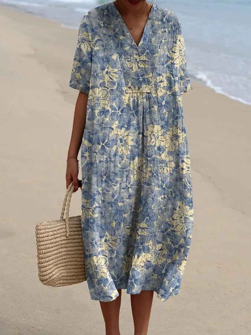 Flowy maxi dress with a stunning floral print, great for bohemian fashion.