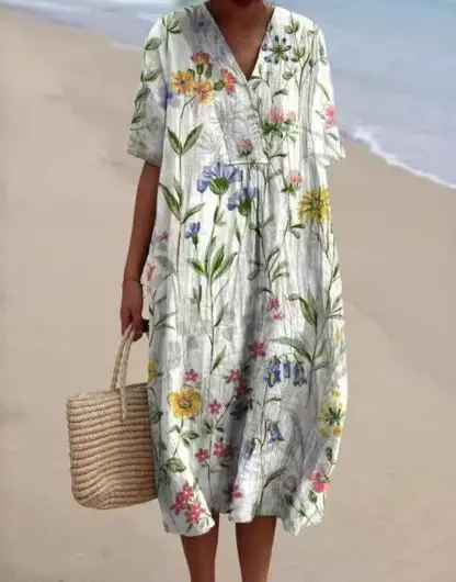 Maxi dress in a bold vintage floral print, perfect for making a statement.