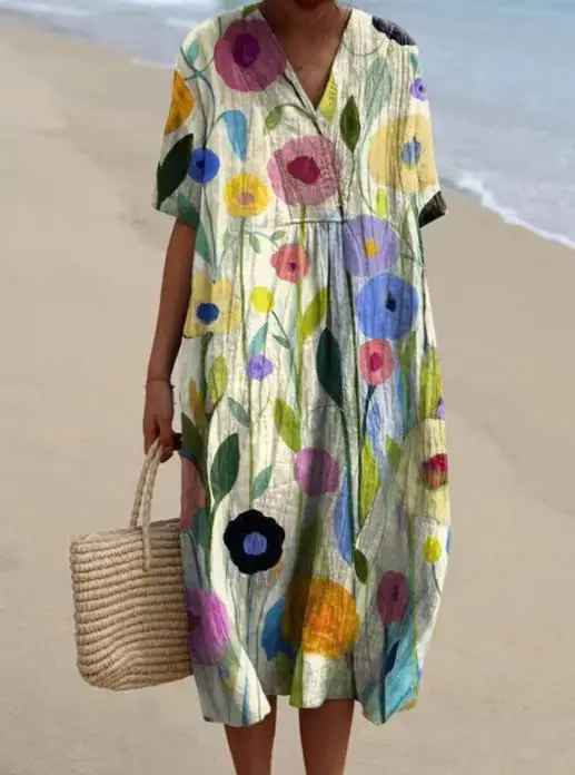 Flowy vintage floral maxi dress with a relaxed fit, great for summer dresses.