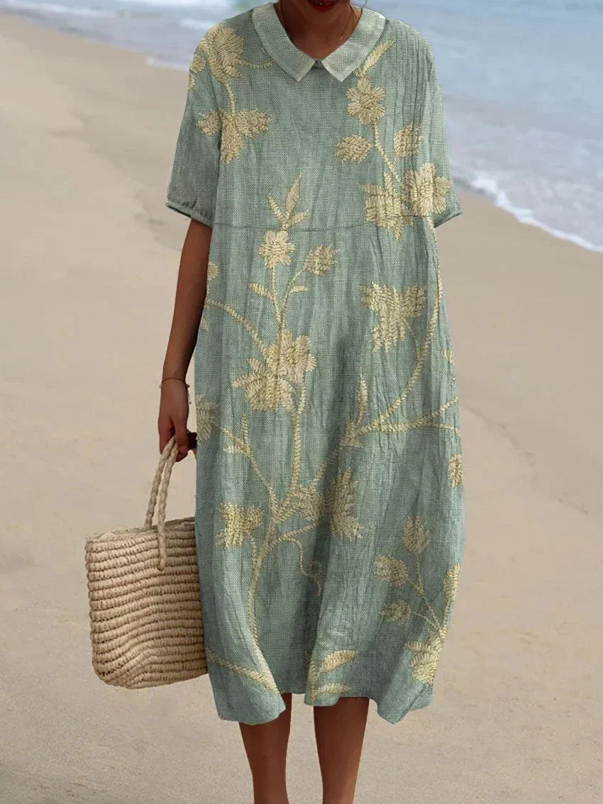 Vintage floral maxi dress for women with a relaxed fit and flowy design.